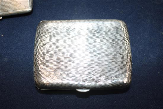 Two silver cigarette cases and a Chinese white metal cigarette case decorated with dragons and prunus, gross weight 8.8 oz.